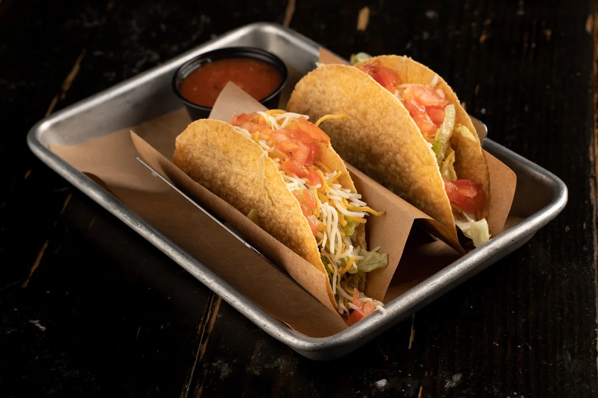 Classic crispy tacos in house made shells with pico and shredded cheese